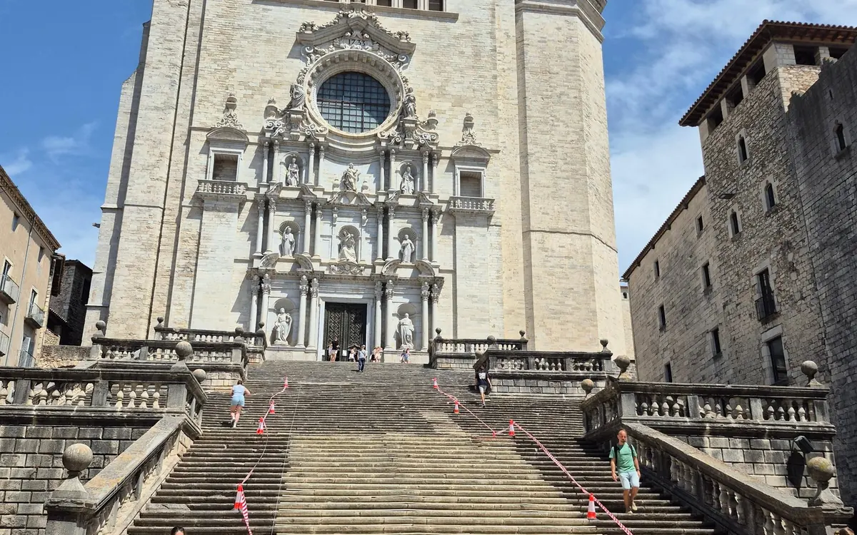 The wide stone staircase leading up to the cathedral front in Girona